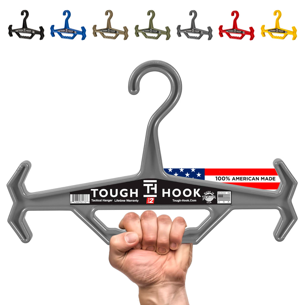 Tough Hook with a hand holding it, displayed against a white background